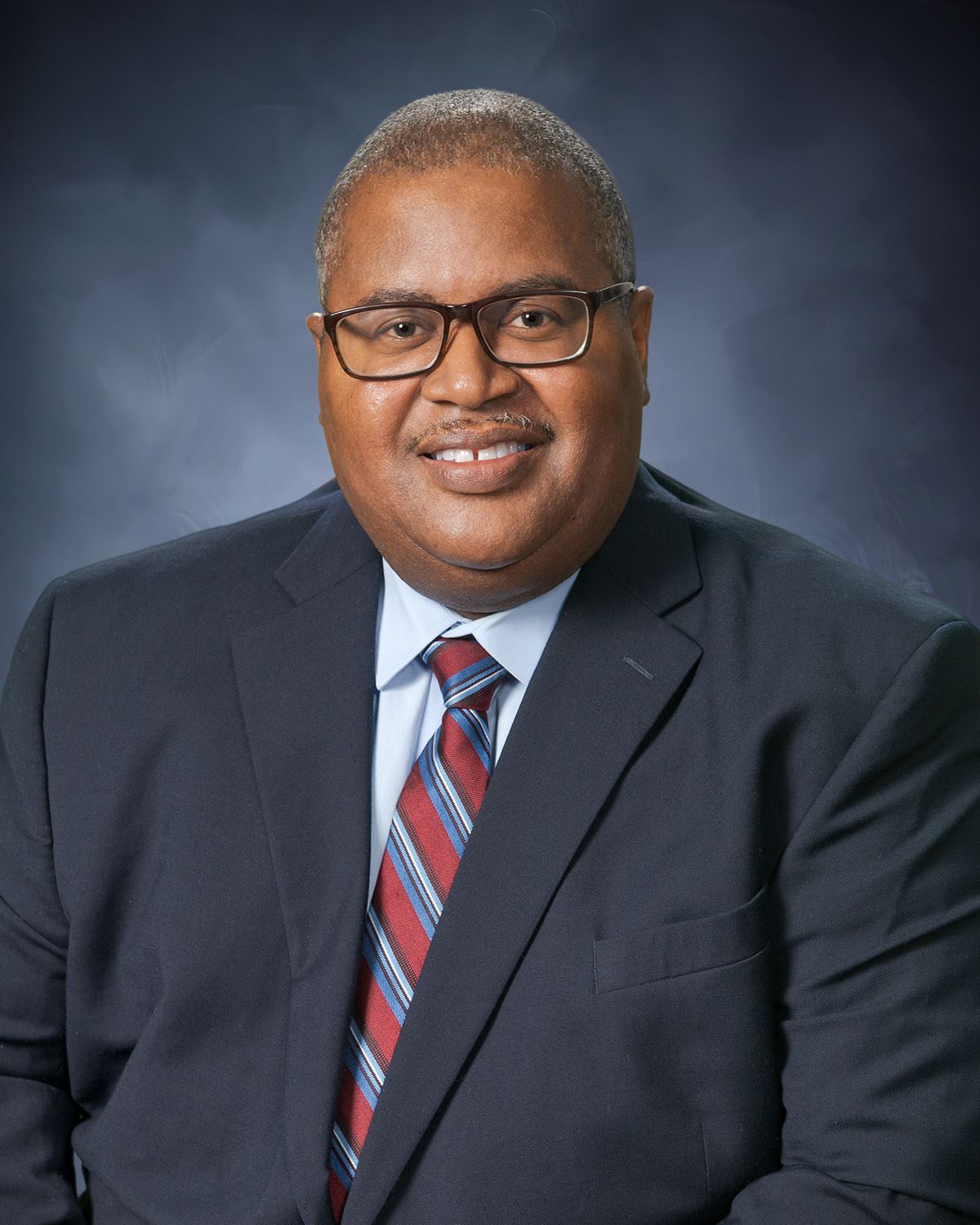 Photo of Councilmember Ed Perry from the waist up.