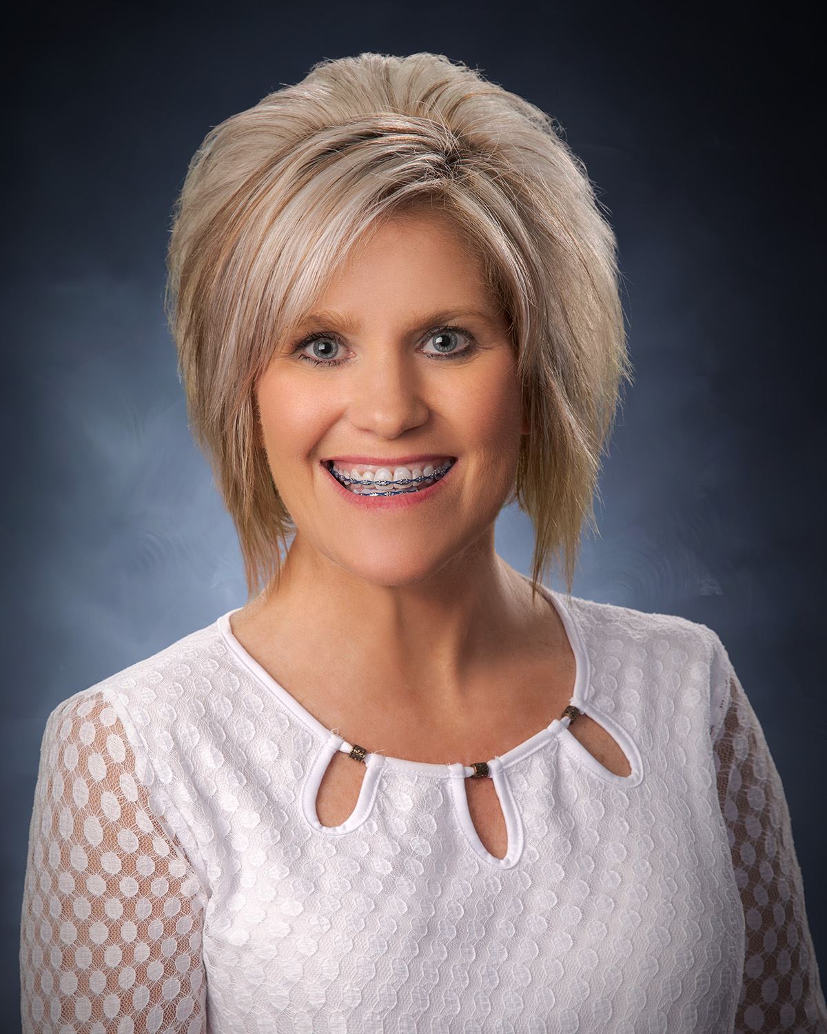 Photo of the waist up of Tammy Bell.